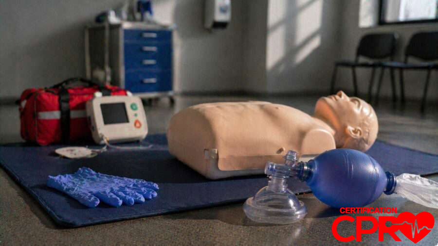 CPR training manikin with AED and rescue mask for certification in Chicago.
